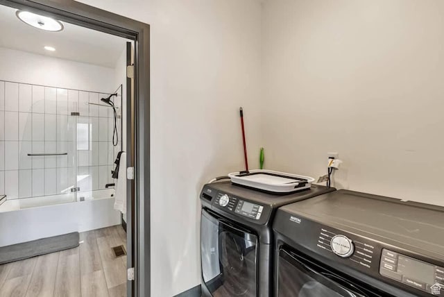 840 W Hilltop Ct, Francis, UT 84036 - laundry room featuring laundry area, washing machine and clothes dryer, and wood finished floors