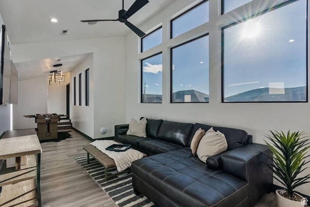 840 W Hilltop Ct, Francis, UT 84036 - living area with light wood-style flooring, visible vents, baseboards, and ceiling fan