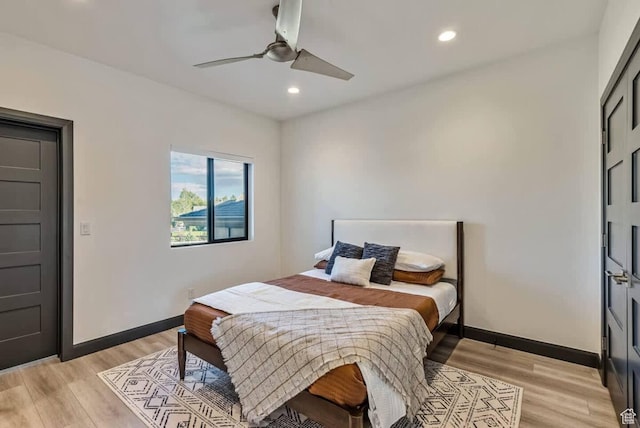 840 W Hilltop Ct, Francis, UT 84036 - bedroom with light wood-style floors, ceiling fan, baseboards, and recessed lighting