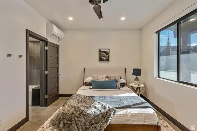 840 W Hilltop Ct, Francis, UT 84036 - bedroom featuring recessed lighting, a wall mounted air conditioner, concrete floors, and baseboards