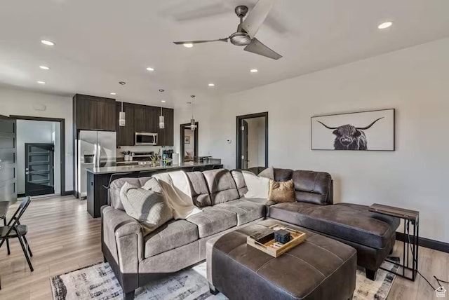 840 W Hilltop Ct, Francis, UT 84036 - living area featuring baseboards, recessed lighting, a ceiling fan, and light wood-style floors