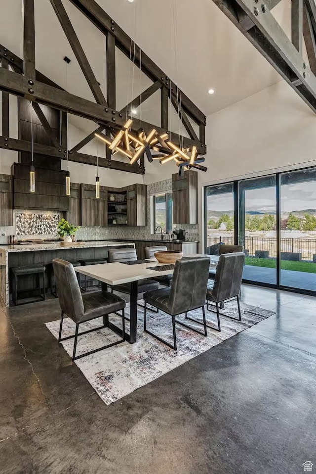 840 W Hilltop Ct, Francis, UT 84036 - dining space featuring finished concrete flooring, high vaulted ceiling, a chandelier, and beamed ceiling