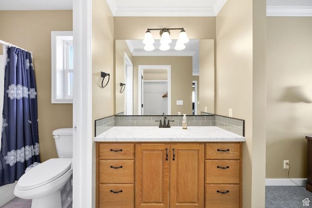 897 N 250 W, Logan, UT 84321 - bathroom featuring baseboards, vanity, toilet, and crown molding