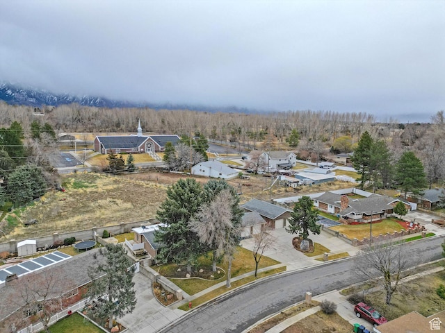 8693 S Vaquero Dr, Sandy, UT 84094 - drone / aerial view with a wooded view