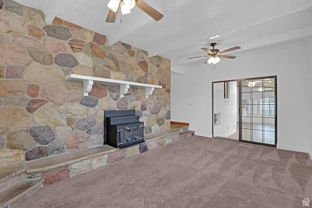 8693 S Vaquero Dr, Sandy, UT 84094 - unfurnished living room featuring carpet floors, beam ceiling, a wood stove, a textured ceiling, and a ceiling fan