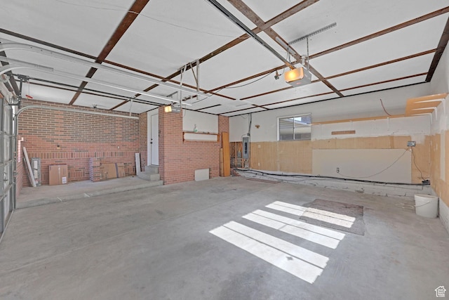 8693 S Vaquero Dr, Sandy, UT 84094 - garage featuring a garage door opener