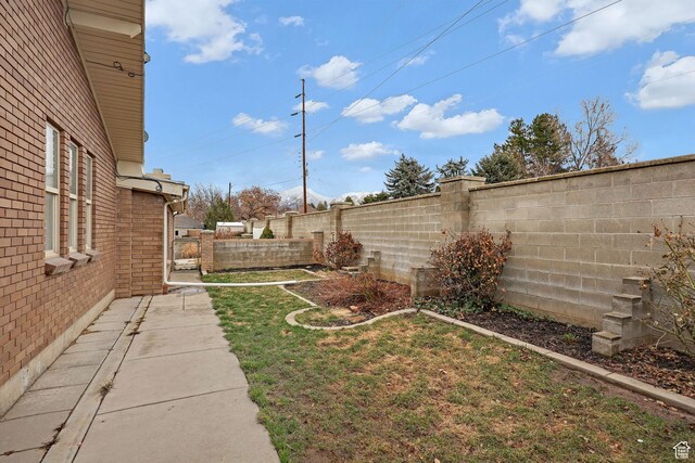 8693 S Vaquero Dr, Sandy, UT 84094 - view of yard featuring a fenced backyard