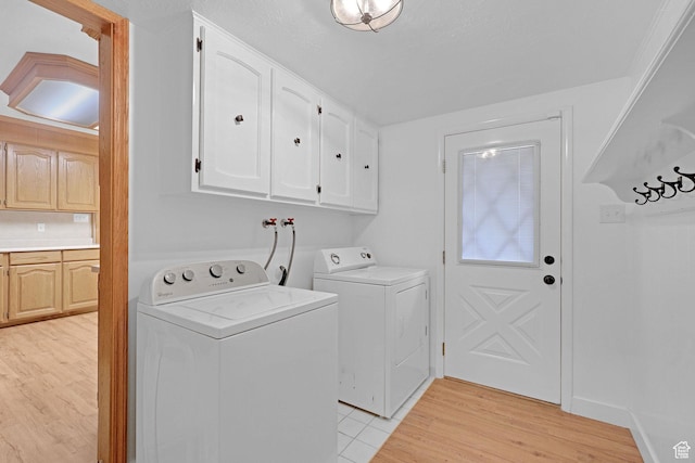 8693 S Vaquero Dr, Sandy, UT 84094 - clothes washing area with cabinet space, separate washer and dryer, and light wood finished floors