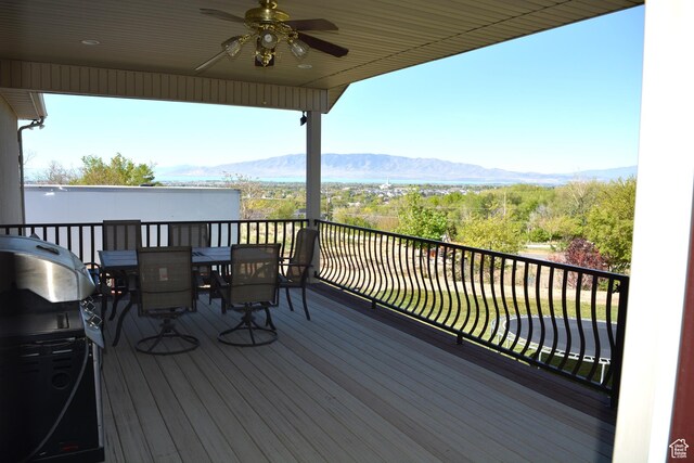 9575 Aztec Dr, Cedar Hills, UT 84062 - wooden deck featuring outdoor dining area, a mountain view, ceiling fan, and area for grilling
