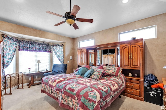 9575 Aztec Dr, Cedar Hills, UT 84062 - bedroom with ceiling fan and light colored carpet