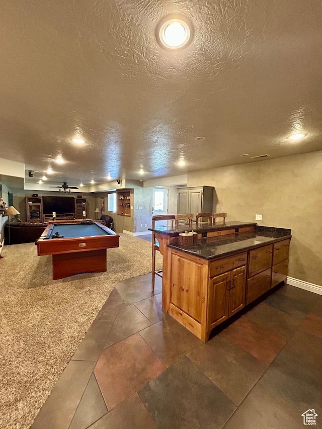9575 Aztec Dr, Cedar Hills, UT 84062 - game room featuring dark tile patterned flooring, pool table, a textured ceiling, and baseboards