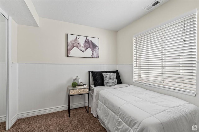 2419 N Nectar Way, Saratoga Springs, UT 84045 - carpeted bedroom with a wainscoted wall