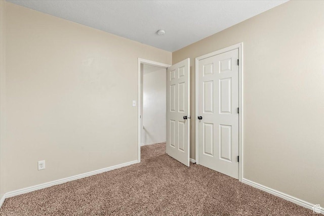 2419 N Nectar Way, Saratoga Springs, UT 84045 - unfurnished bedroom featuring carpet and baseboards