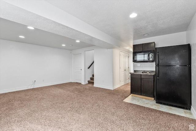 2419 N Nectar Way, Saratoga Springs, UT 84045 - kitchen with black appliances, light carpet, a textured ceiling, recessed lighting, and baseboards