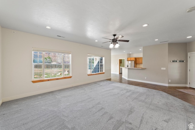4224 Valle Del Sol, Moab, UT 84532 - unfurnished living room featuring recessed lighting, visible vents, a ceiling fan, baseboards, and carpet