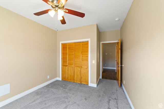 4224 Valle Del Sol, Moab, UT 84532 - unfurnished bedroom featuring ceiling fan, a closet, baseboards, and carpet flooring