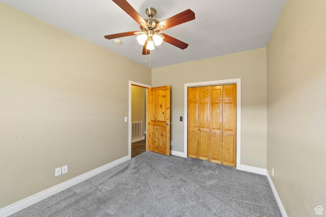 4224 Valle Del Sol, Moab, UT 84532 - unfurnished bedroom featuring visible vents, baseboards, ceiling fan, carpet flooring, and a closet