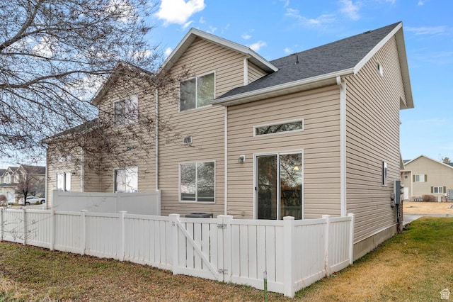 1351 Westbridge Cir, Provo, UT 84601 - rear view of house with fence and roof with shingles