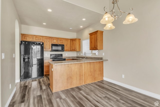 1351 Westbridge Cir, Provo, UT 84601 - kitchen featuring black appliances, baseboards, a sink, wood finished floors, and recessed lighting