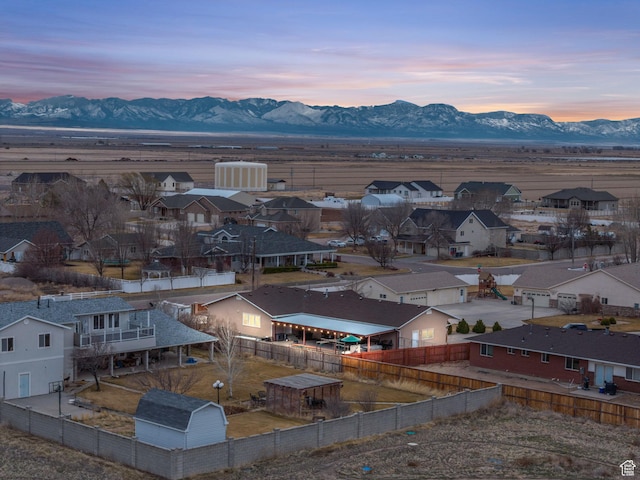 drone / aerial view with a mountain view and a residential view