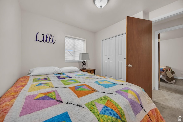 carpeted bedroom featuring a closet