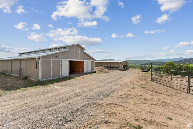 11680 E 29130 N, Fairview, UT 84629 - view of outdoor structure featuring a mountain view, driveway, and an exterior structure