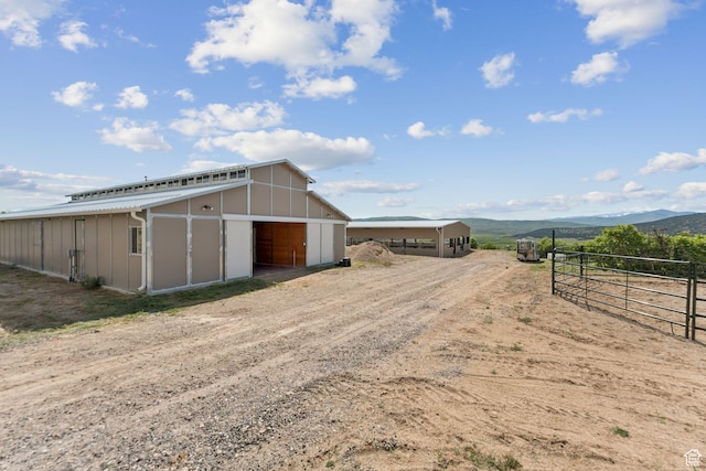 11680 E 29130 N, Fairview, UT 84629 - view of outdoor structure featuring a mountain view, driveway, and an exterior structure