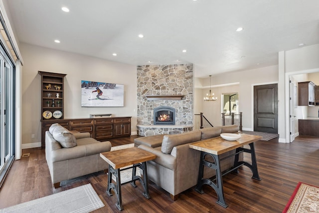 11680 E 29130 N, Fairview, UT 84629 - living room with wood finished floors, recessed lighting, baseboards, a stone fireplace, and a chandelier