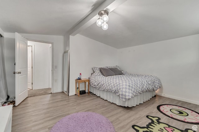 3734 S Bannock St, West Valley City, UT 84120 - bedroom with vaulted ceiling with beams, light wood-type flooring, and baseboards