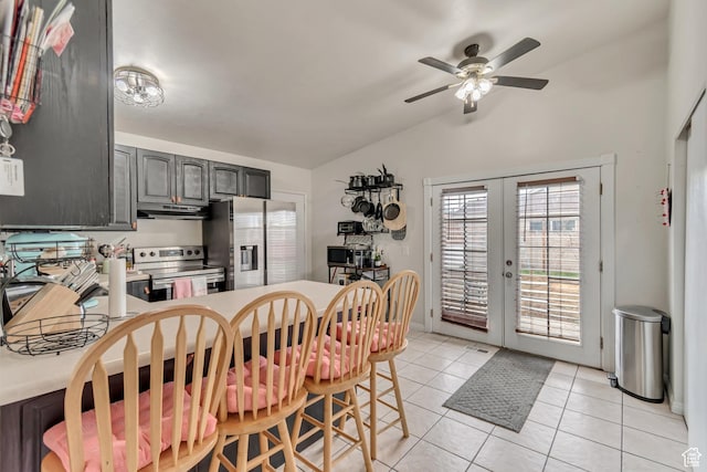 3734 S Bannock St, West Valley City, UT 84120 - dining room with lofted ceiling, french doors, ceiling fan, and light tile patterned floors