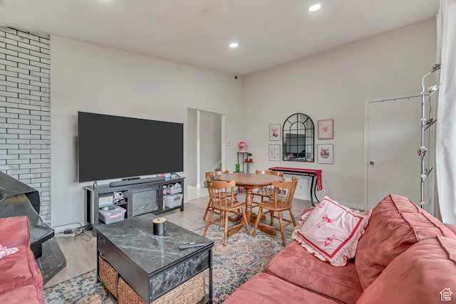 3734 S Bannock St, West Valley City, UT 84120 - living room featuring recessed lighting, wood finished floors, baseboards, and stairs