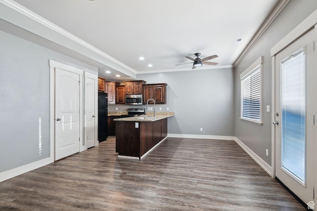 2887 N 1175 W, Layton, UT 84041 - kitchen featuring a peninsula, dark wood-style floors, baseboards, and appliances with stainless steel finishes