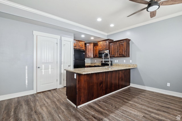2887 N 1175 W, Layton, UT 84041 - kitchen with baseboards, dark wood-style floors, stainless steel microwave, freestanding refrigerator, and a peninsula
