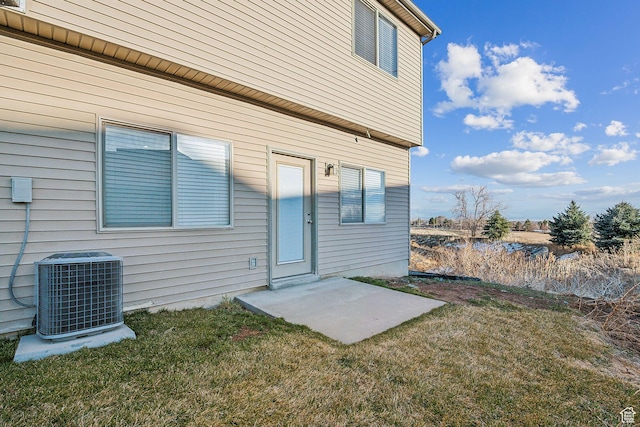 2887 N 1175 W, Layton, UT 84041 - rear view of house with a lawn and cooling unit