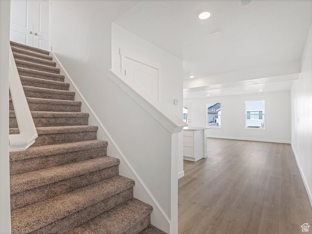 1604 E Pheasant Rd Unit 208, Eagle Mountain, UT 84005 - stairs with recessed lighting, baseboards, and wood finished floors