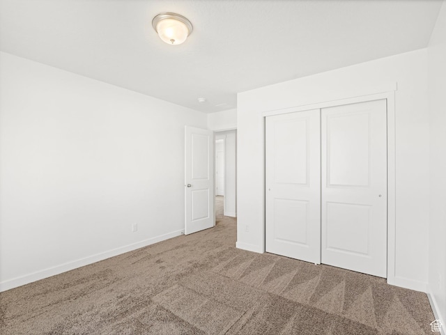 1604 E Pheasant Rd Unit 208, Eagle Mountain, UT 84005 - unfurnished bedroom with a closet, baseboards, and carpet