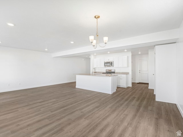 1604 E Pheasant Rd Unit 208, Eagle Mountain, UT 84005 - kitchen with light wood-style flooring, a sink, stainless steel appliances, white cabinetry, and open floor plan