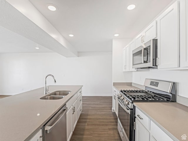 1604 E Pheasant Rd Unit 208, Eagle Mountain, UT 84005 - kitchen featuring dark wood finished floors, recessed lighting, white cabinets, stainless steel appliances, and a sink
