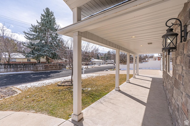 1045 Fox Farm Rd, Logan, UT 84321 - view of patio / terrace with covered porch and fence