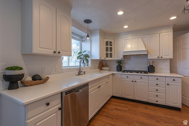 1045 Fox Farm Rd, Logan, UT 84321 - kitchen with stainless steel appliances, custom exhaust hood, a sink, and white cabinets
