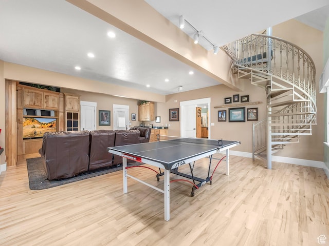 game room featuring light wood finished floors, baseboards, and recessed lighting