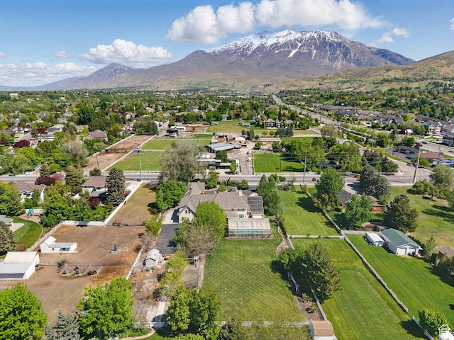 aerial perspective of suburban area featuring a mountain backdrop