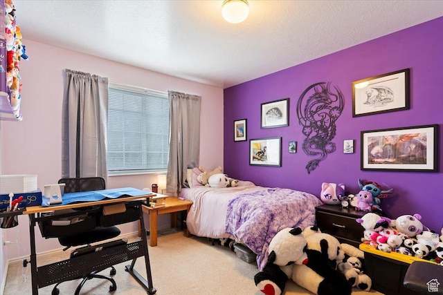 carpeted bedroom featuring a textured ceiling