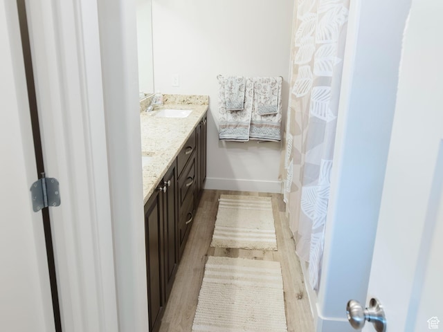 926 N 165 W, Nephi, UT 84648 - bathroom with baseboards, wood finished floors, and vanity