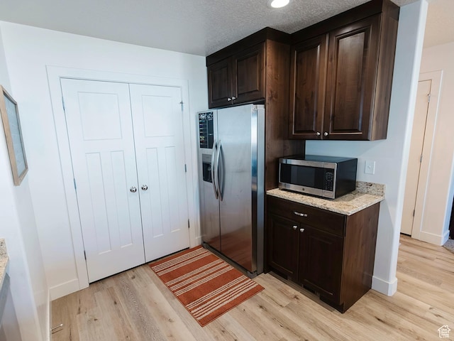 926 N 165 W, Nephi, UT 84648 - kitchen with appliances with stainless steel finishes, light wood-type flooring, and dark brown cabinetry