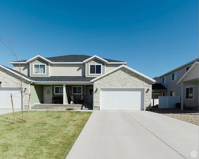 926 N 165 W, Nephi, UT 84648 - traditional-style home with a porch, a front yard, fence, a garage, and driveway