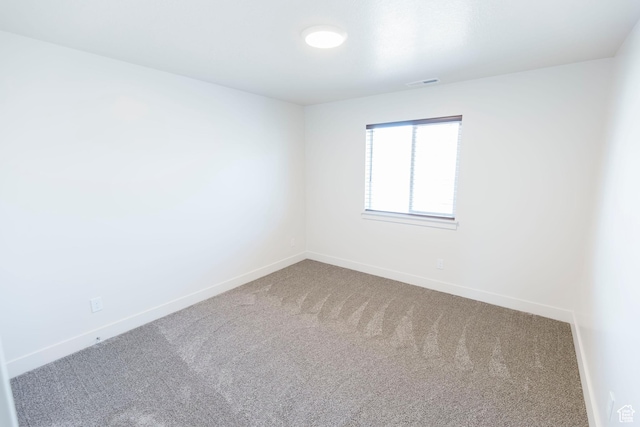 926 N 165 W, Nephi, UT 84648 - spare room featuring carpet floors, visible vents, and baseboards