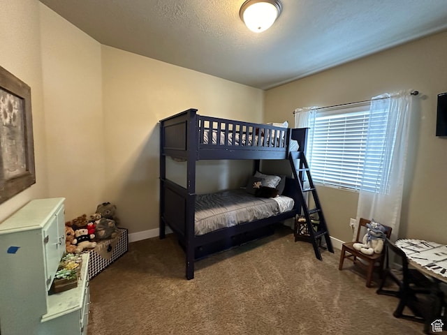 338 S 1230 E, Tooele, UT 84074 - bedroom with a textured ceiling, baseboards, and carpet