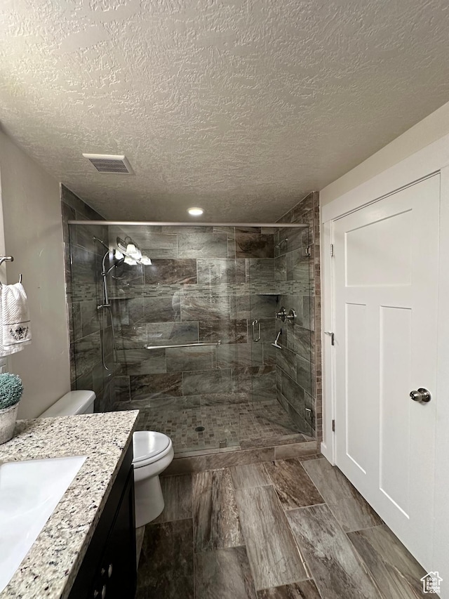 338 S 1230 E, Tooele, UT 84074 - full bath with toilet, vanity, a shower stall, and visible vents
