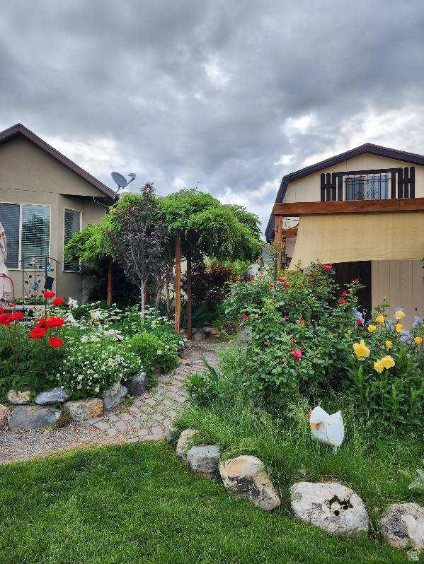 338 S 1230 E, Tooele, UT 84074 - view of yard featuring a balcony